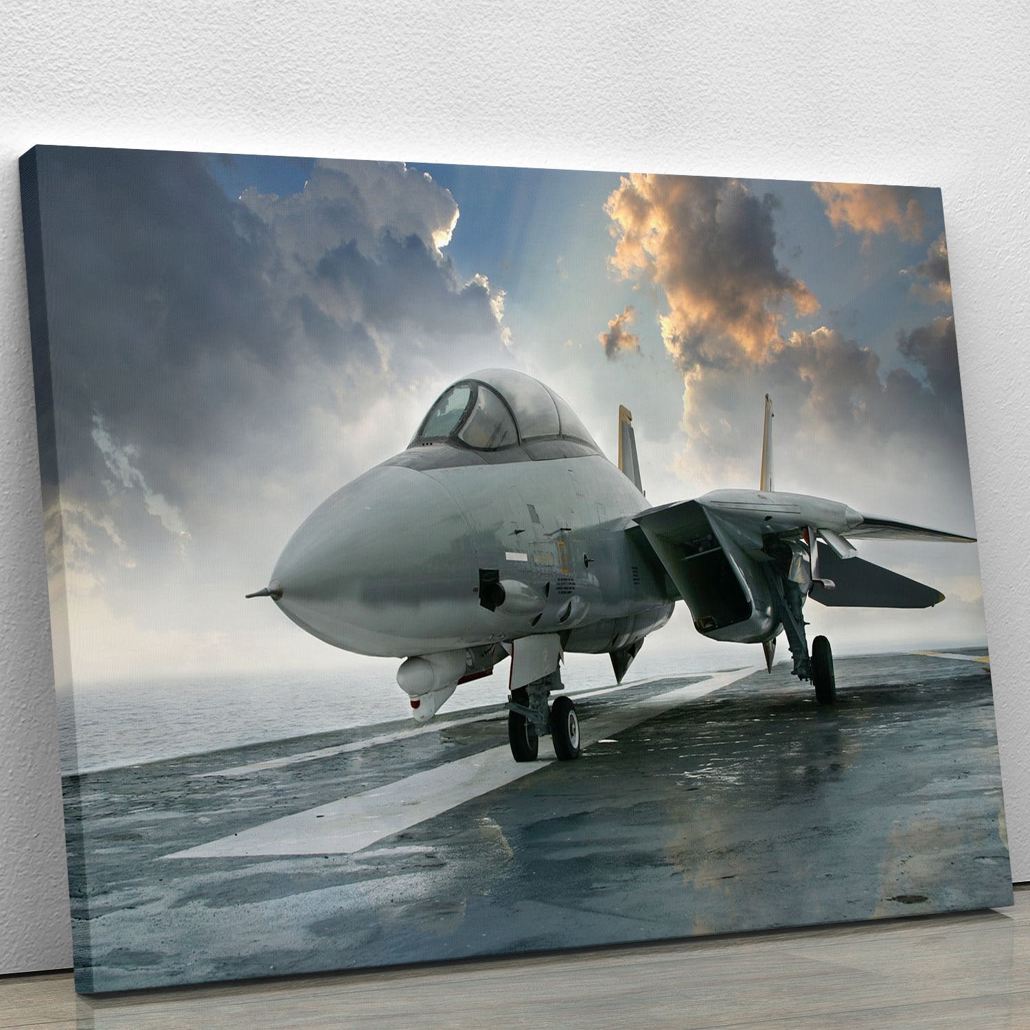 An jet fighter sits on the deck Canvas Print or Poster