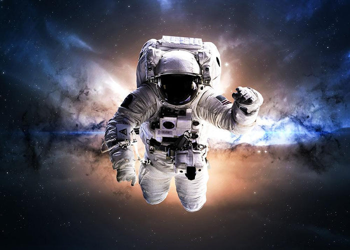 Astronaut in galaxy Wall Mural Wallpaper