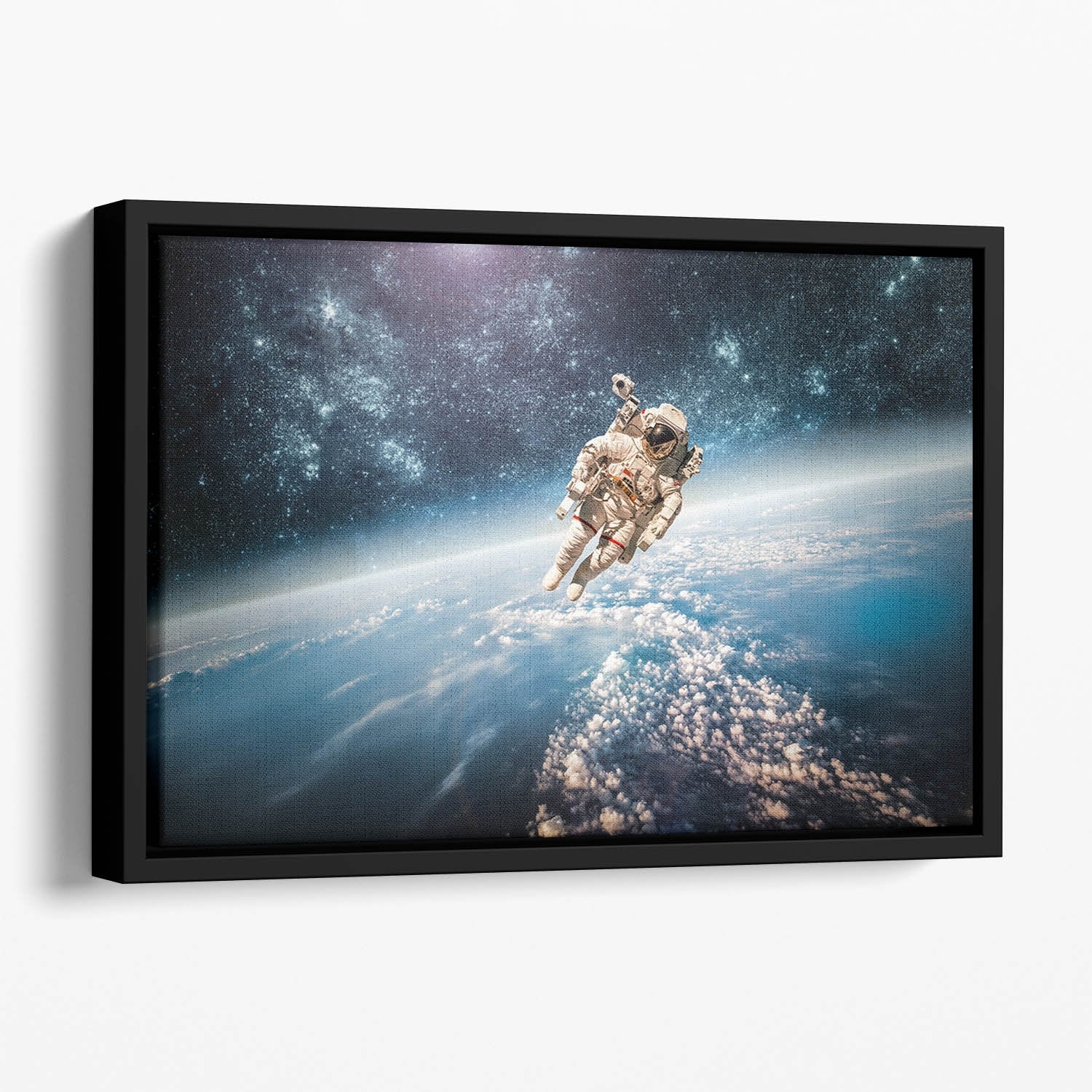 Astronaut in outer space planet earth Floating Framed Canvas