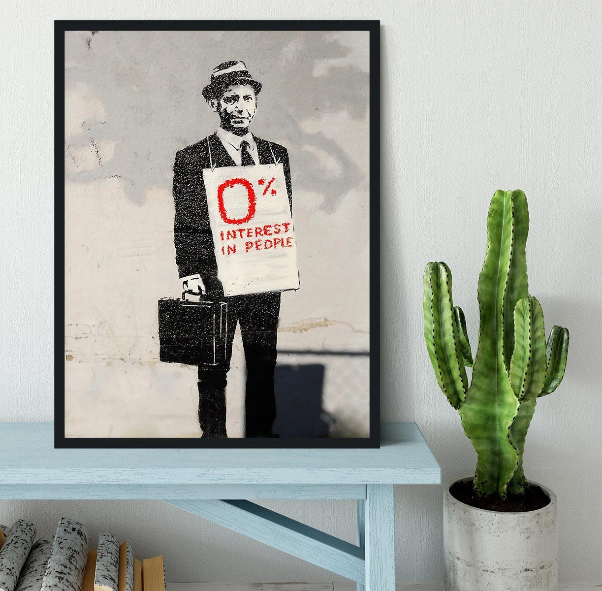 Banksy Zero Per Cent Interest in People Framed Print