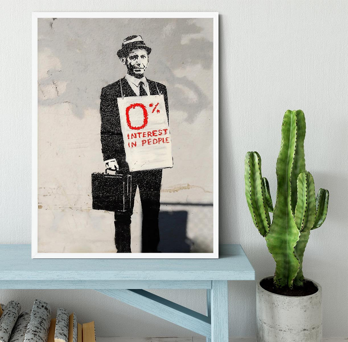 Banksy Zero Per Cent Interest in People Framed Print