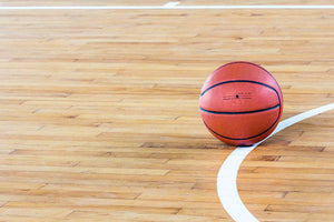 Basketball ball in the gym Wall Mural Wallpaper - Canvas Art Rocks - 1
