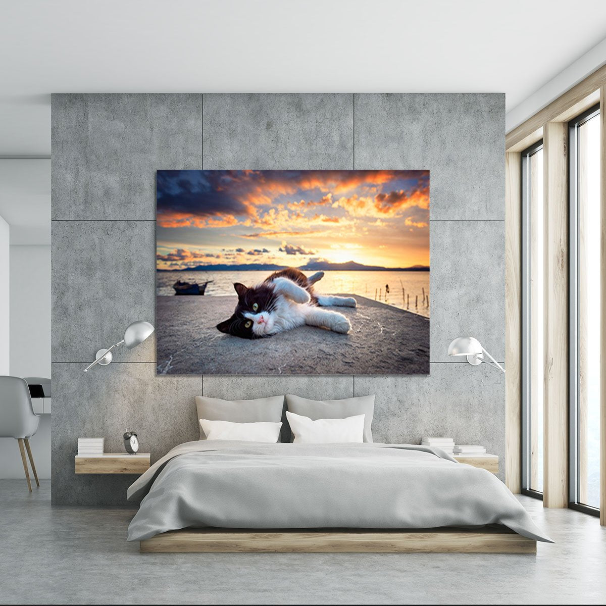 Black and white cat lying under a dramatic sunset on the lagoon Canvas Print or Poster