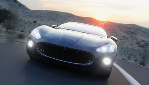 Black sport car on road Wall Mural Wallpaper - Canvas Art Rocks - 1