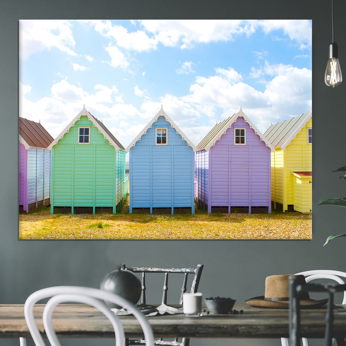 British beach huts on a bright sunny day Canvas Print or Poster
