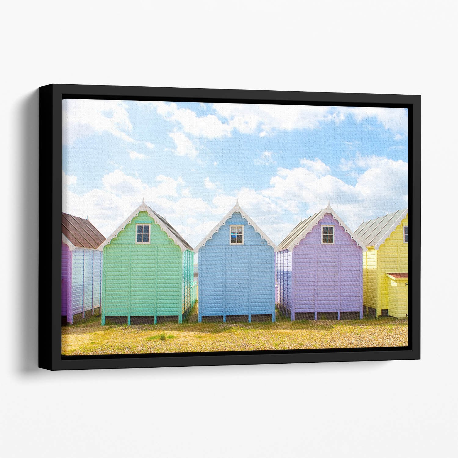 British beach huts on a bright sunny day Floating Framed Canvas