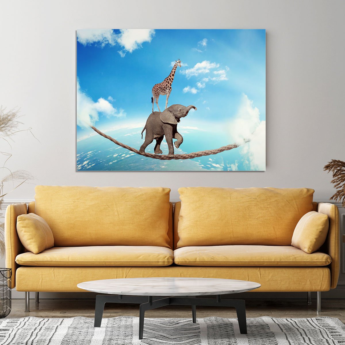 Elephant with giraffe walking on dangerous rope high in sky Canvas Print or Poster