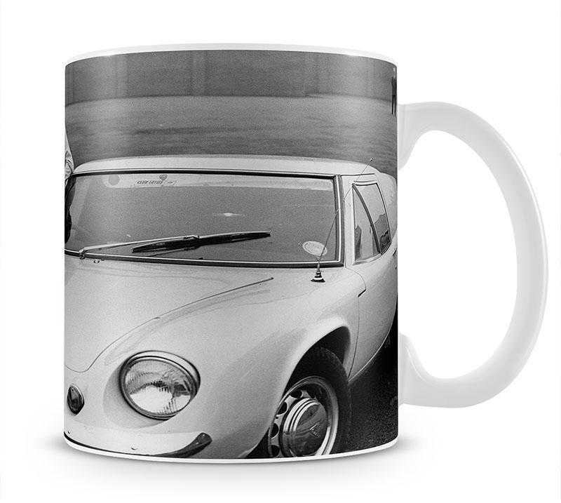 George Best with his Lotus Europa Mug - Canvas Art Rocks - 1