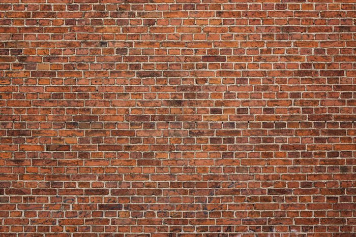 Grunge red brick wall Wall Mural Wallpaper