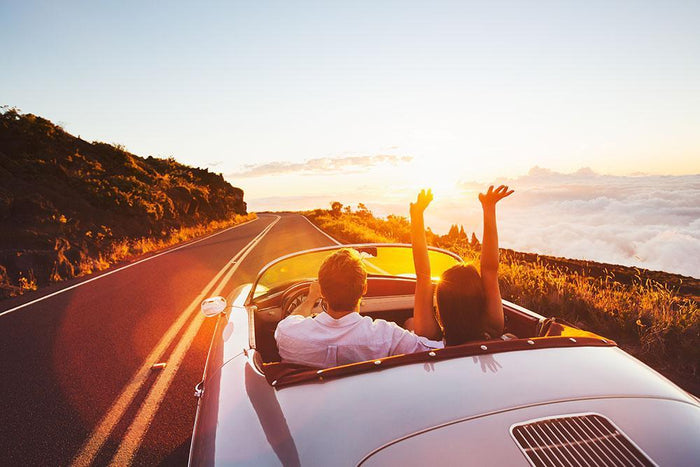Happy Couple Driving Wall Mural Wallpaper