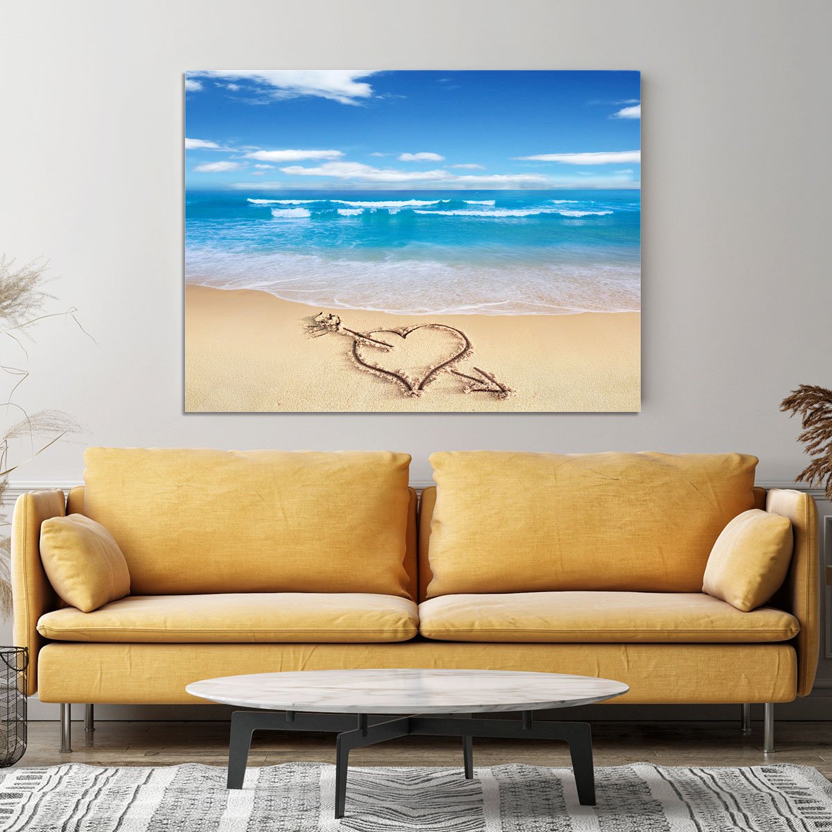 Heart with arrow in sand Canvas Print or Poster