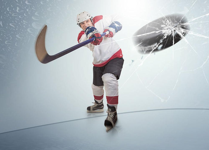 Ice hockey puck hit Wall Mural Wallpaper