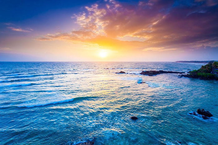 Indian ocean on sunset Wall Mural Wallpaper