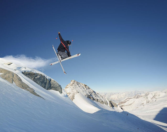 Jumping skier Wall Mural Wallpaper