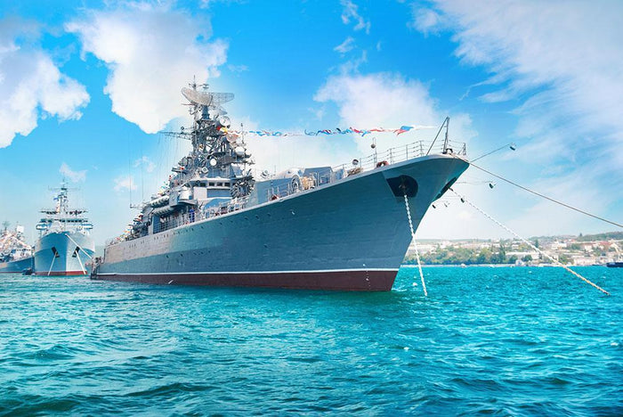 Military sea landscape with blue sky Wall Mural Wallpaper