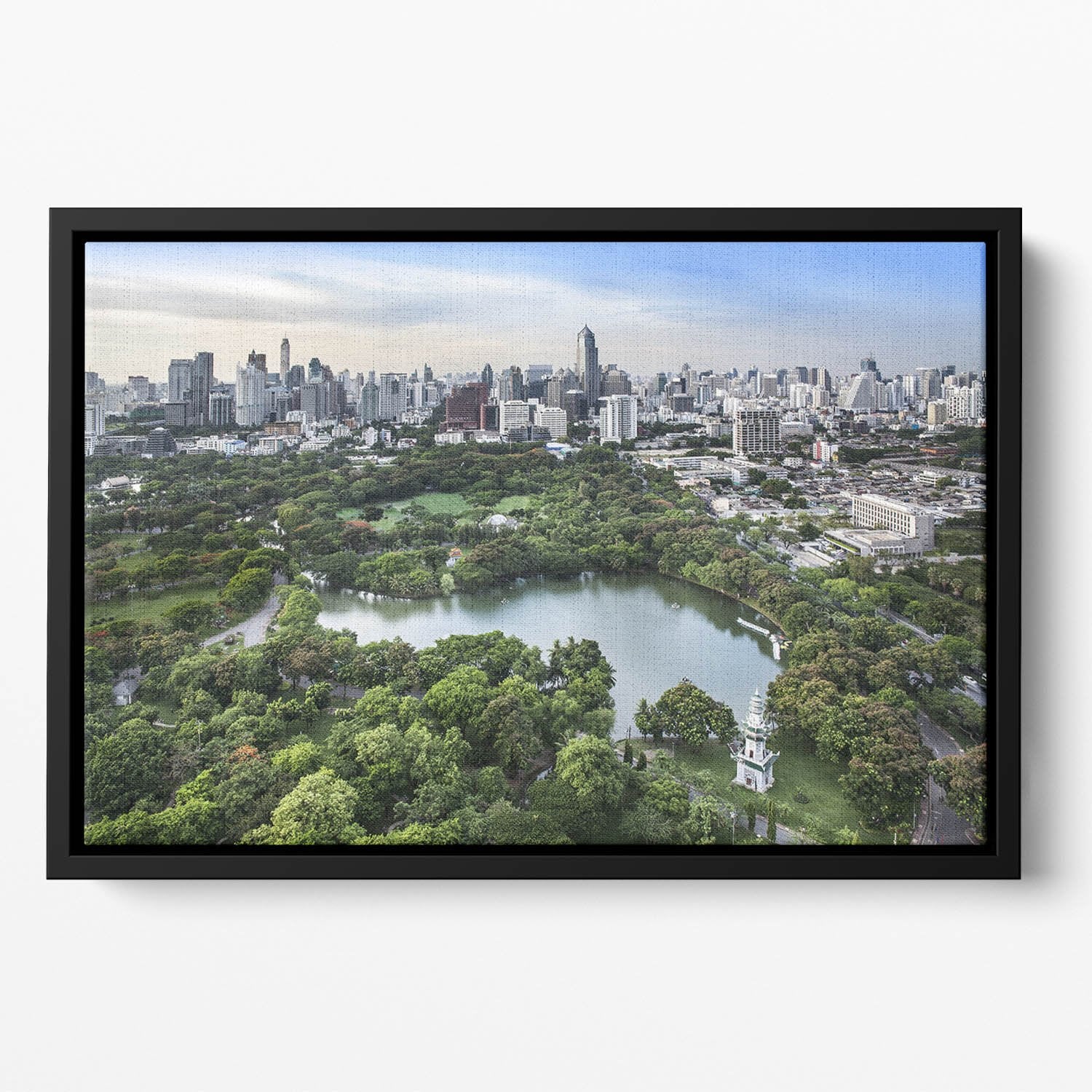 Modern city in a green environment Floating Framed Canvas