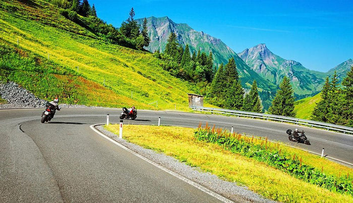 Motorbikers group in the moutains Wall Mural Wallpaper