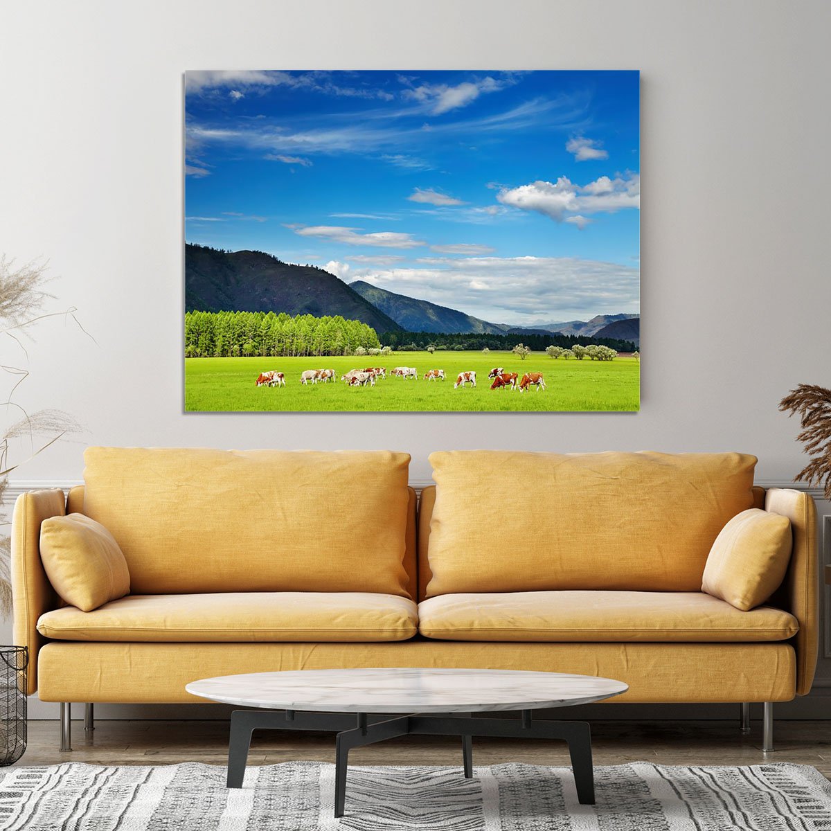 Mountain landscape with grazing cows and sky Canvas Print or Poster