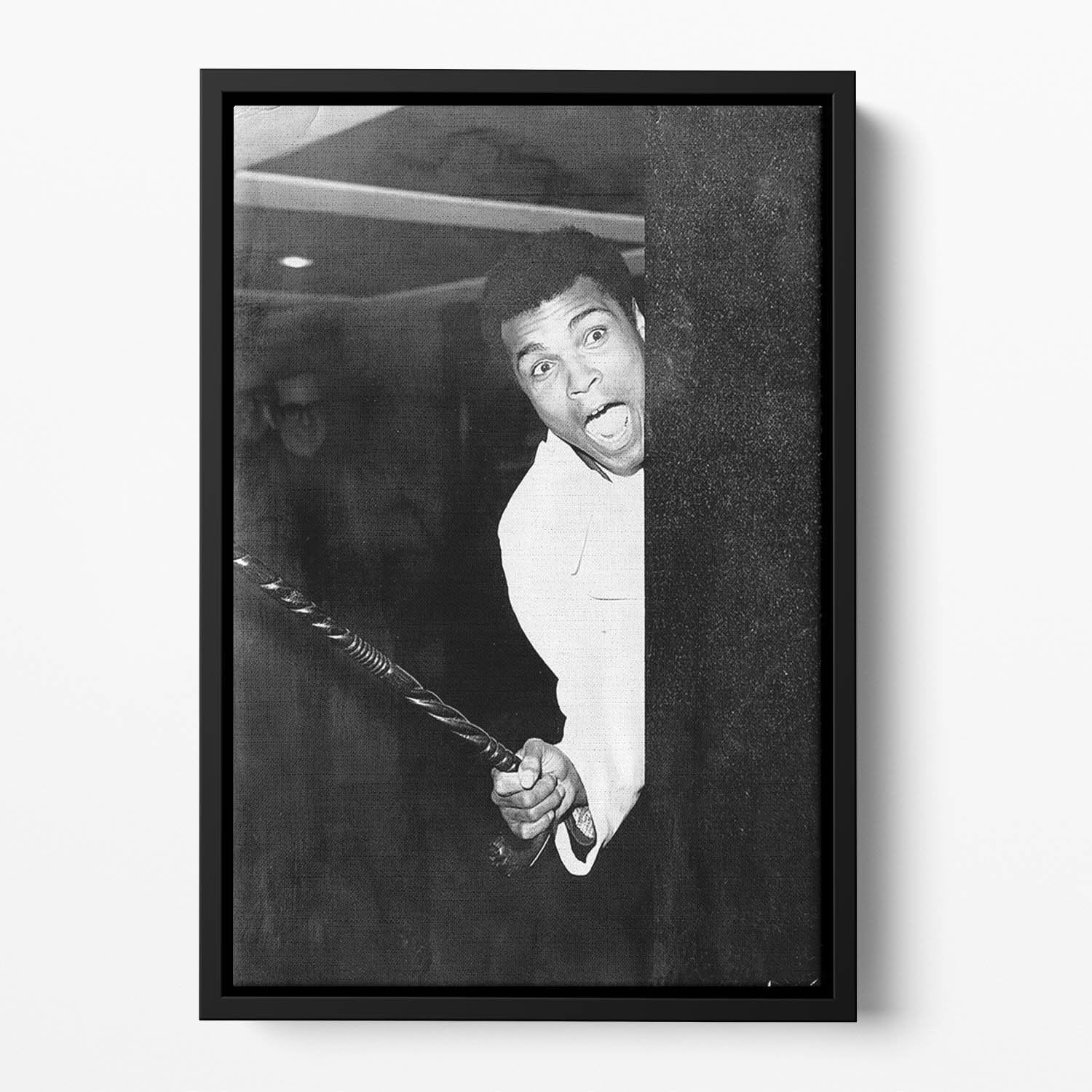 Muhammad Ali larking about at Heathrow Floating Framed Canvas