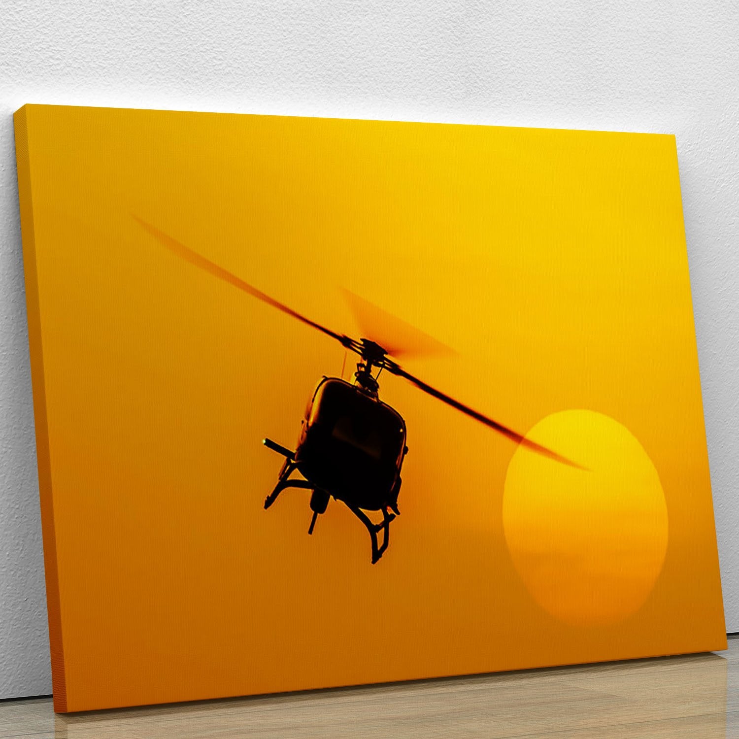 Patrol helicopter flying in sunset Canvas Print or Poster