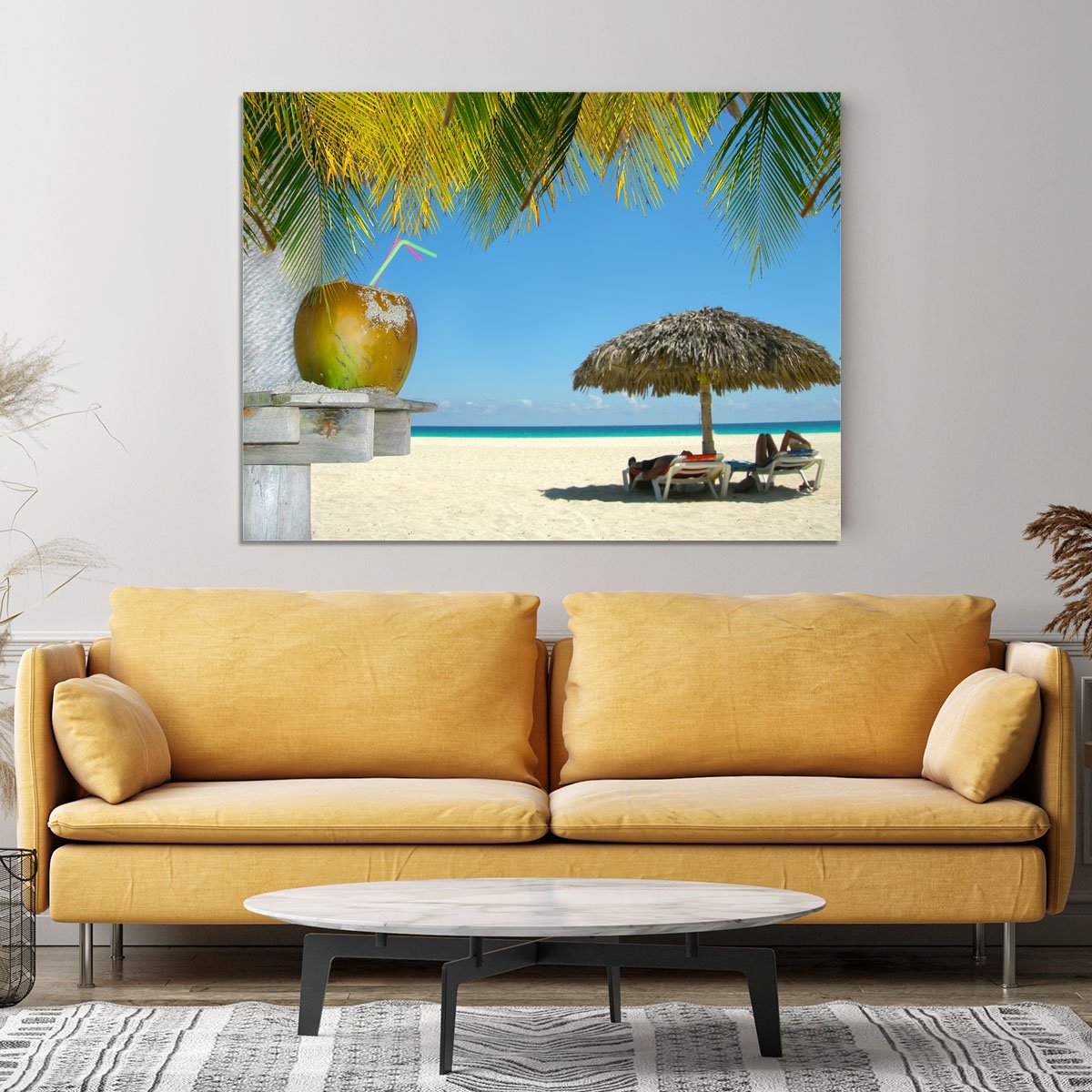 People relaxing under tropical huts with coconut Canvas Print or Poster