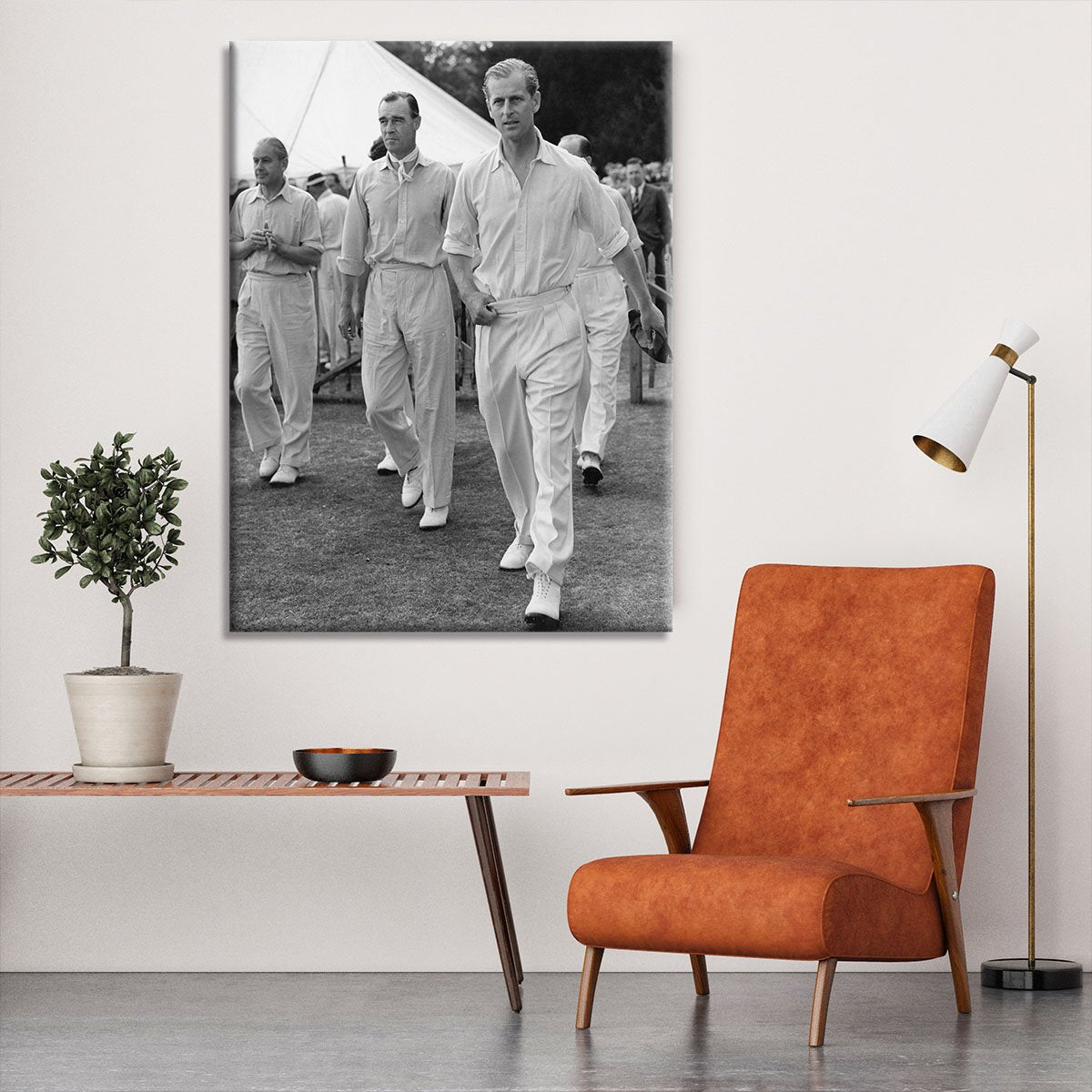Prince Philip leading his cricket team onto the field Canvas Print or Poster