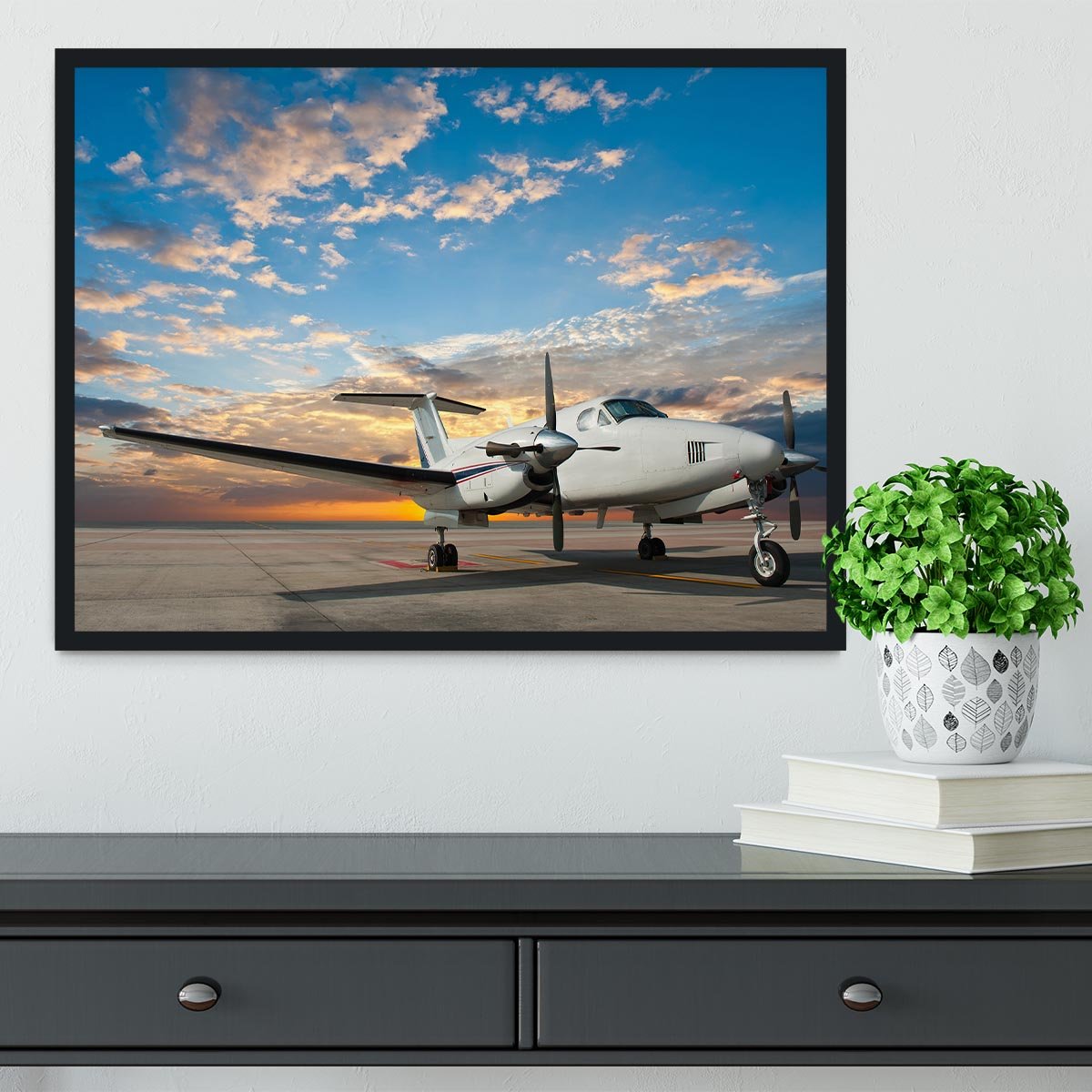 Propeller plane parking at the airport Framed Print - Canvas Art Rocks - 2