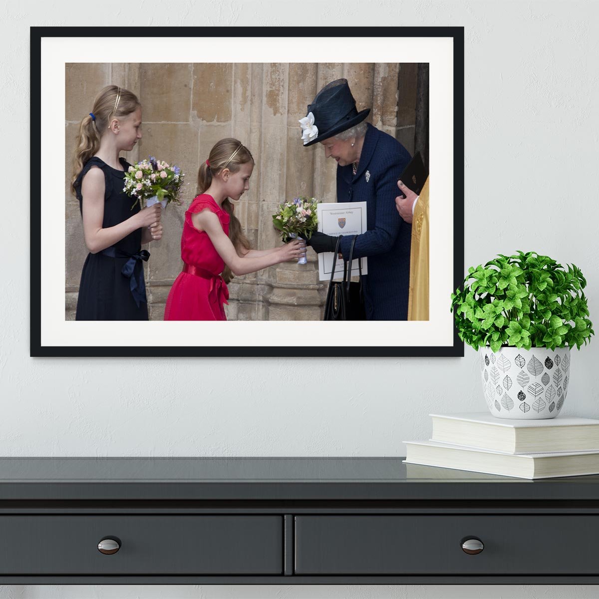 Queen Elizabeth II receiving flowers at a VE Day ceremony Framed Print - Canvas Art Rocks - 1