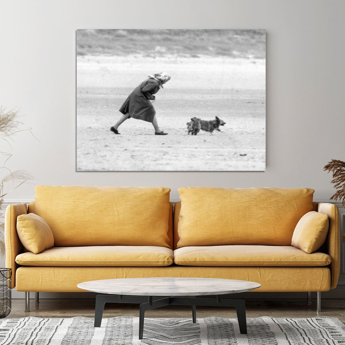 Queen Elizabeth II walking her pet corgis on a Norfolk beach Canvas Print or Poster