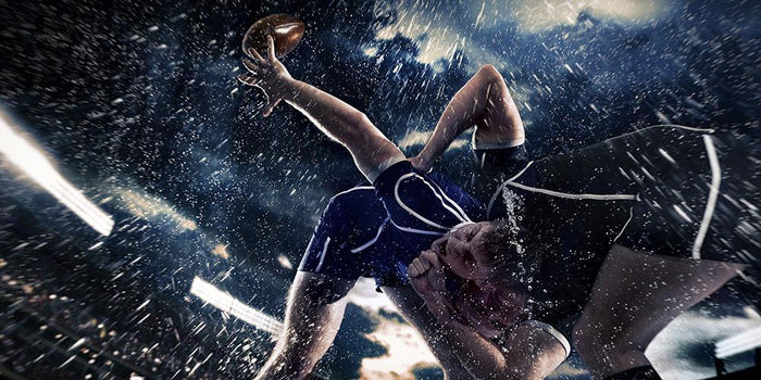 Rugby in the rain Wall Mural Wallpaper