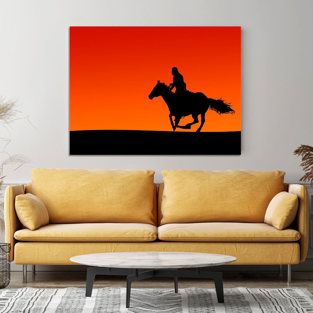 Silhouette of a horse and rider at sunset Canvas Print or Poster