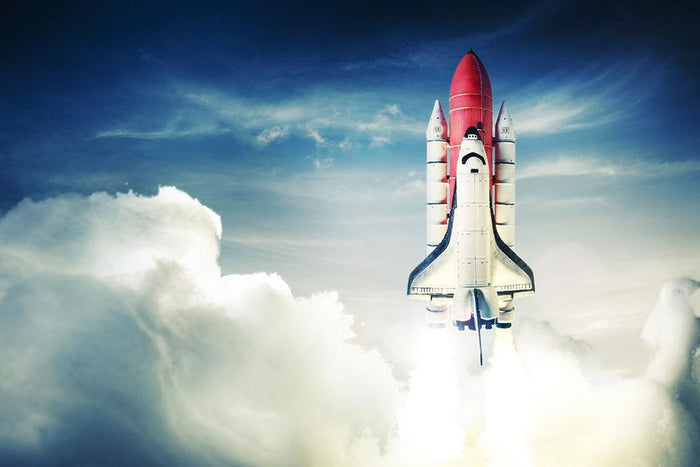Space shuttle taking off on a mission Wall Mural Wallpaper