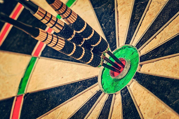 Success hitting target Wall Mural Wallpaper