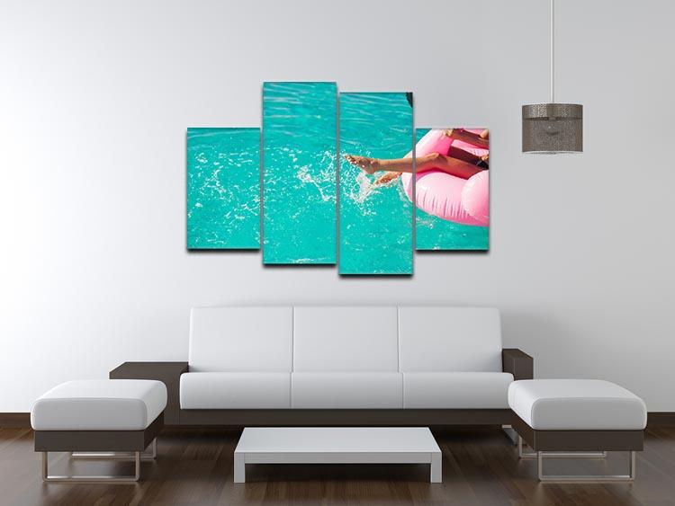 Tan girl sits on inflatable mattress flamingos in the pool 4 Split Panel Canvas - Canvas Art Rocks - 3