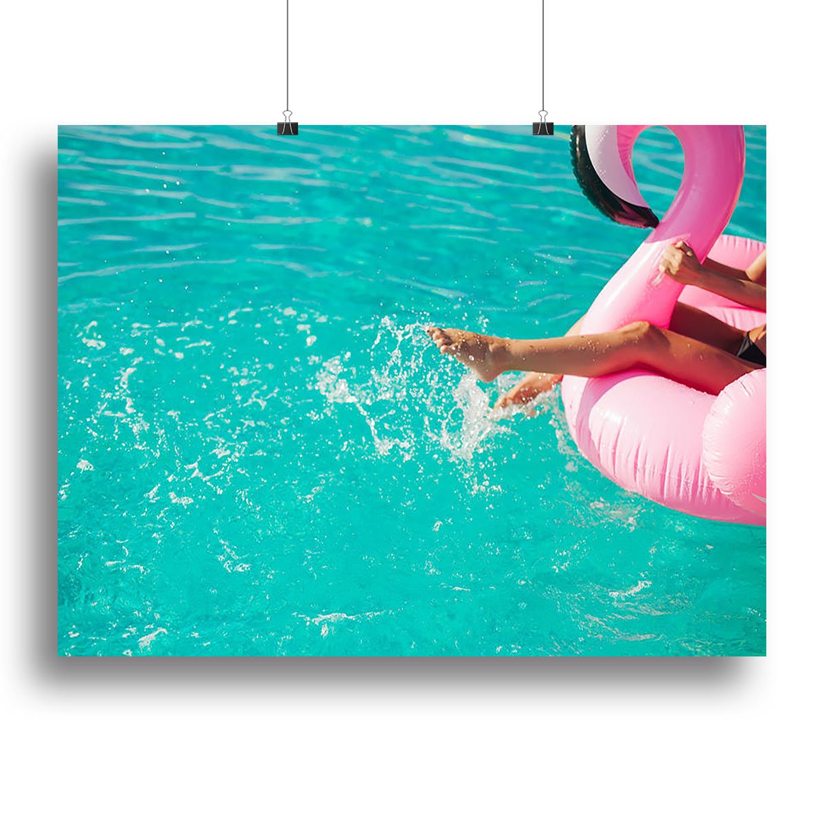 Tan girl sits on inflatable mattress flamingos in the pool Canvas Print or Poster