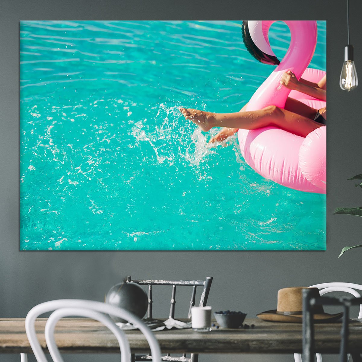Tan girl sits on inflatable mattress flamingos in the pool Canvas Print or Poster