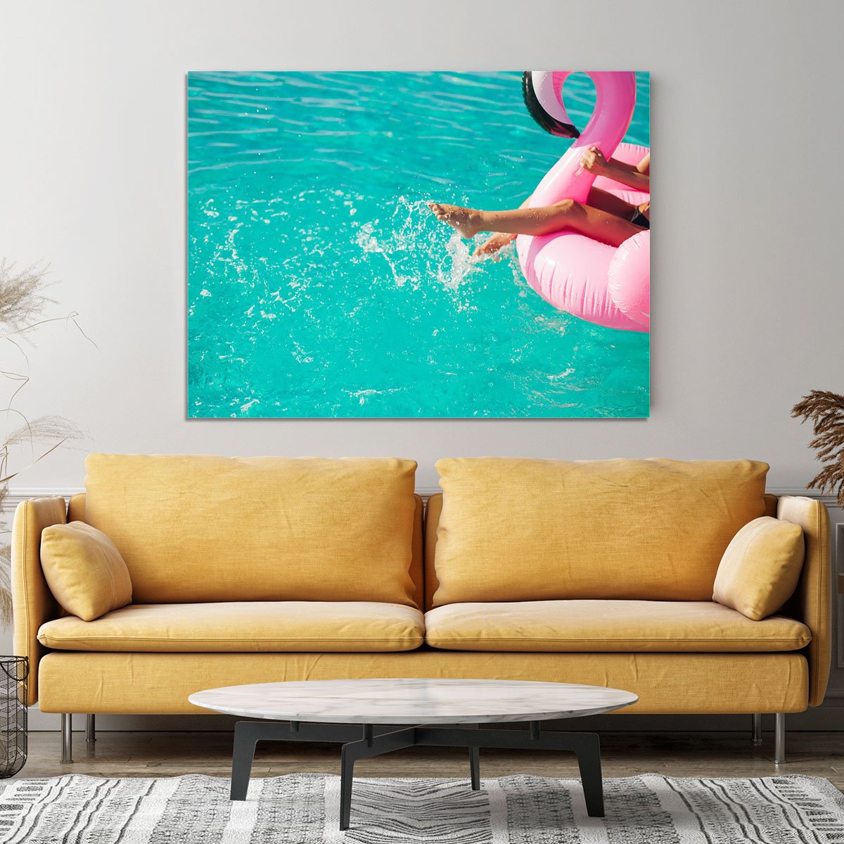 Tan girl sits on inflatable mattress flamingos in the pool Canvas Print or Poster