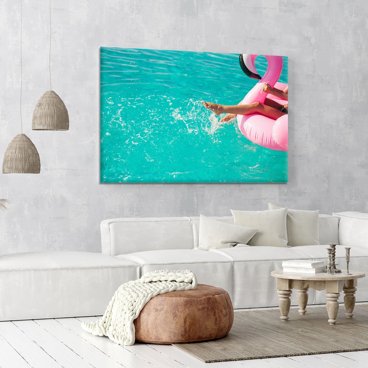 Tan girl sits on inflatable mattress flamingos in the pool Canvas Print or Poster