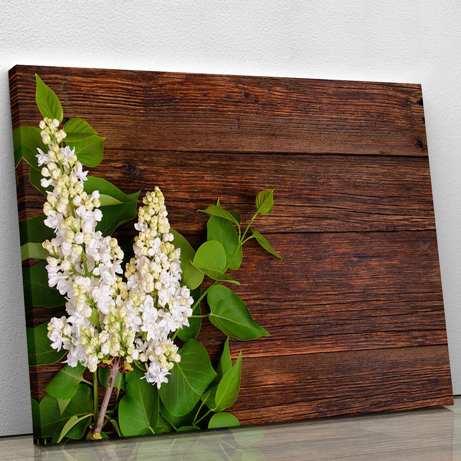 The beautiful lilac on a wooden background Canvas Print or Poster
