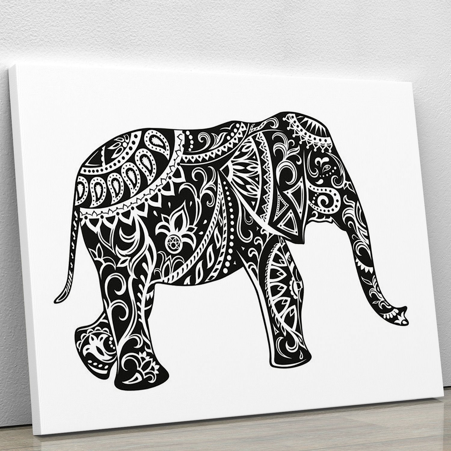 The stylized figure of an elephant in the festive patterns Canvas Print or Poster