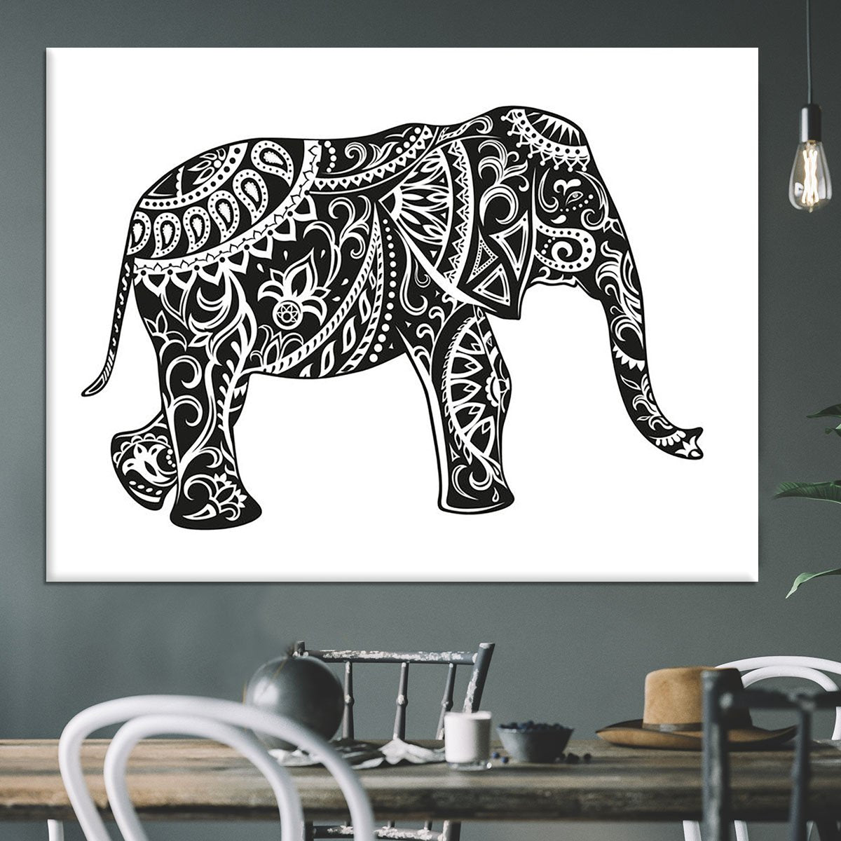 The stylized figure of an elephant in the festive patterns Canvas Print or Poster