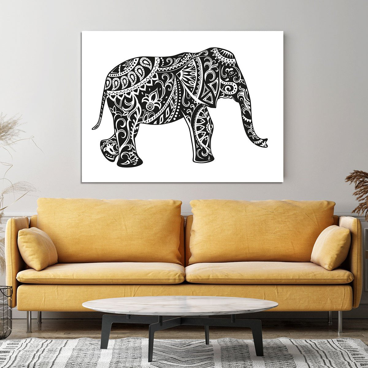 The stylized figure of an elephant in the festive patterns Canvas Print or Poster