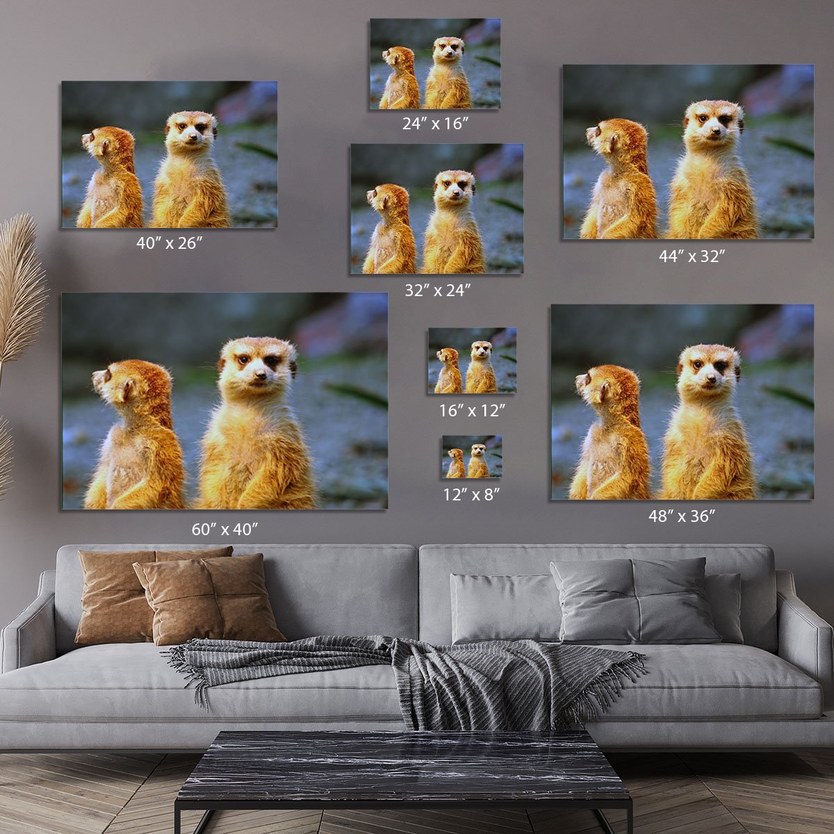 Two meerkats watching over their family in zoo Canvas Print or Poster