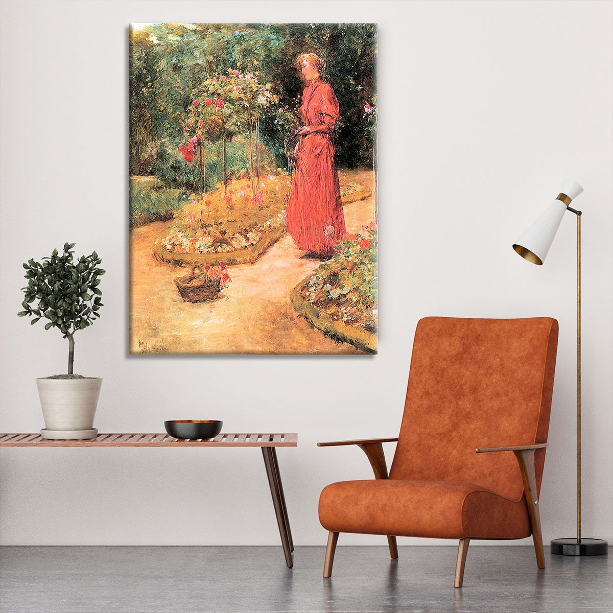 Woman cuts roses in a garden by Hassam Canvas Print or Poster