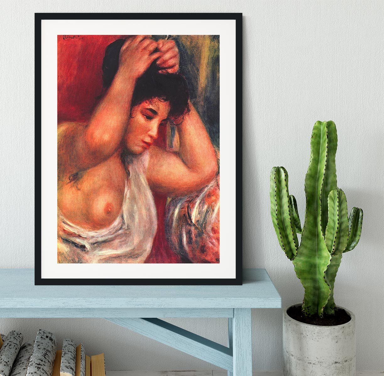 Young woman hairdressing by Renoir Framed Print - Canvas Art Rocks - 1