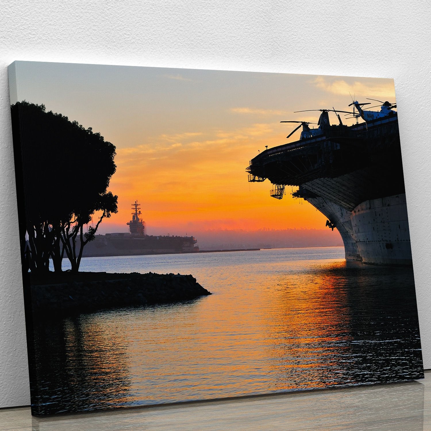 aircraft carrier in harbour in sunset Canvas Print or Poster