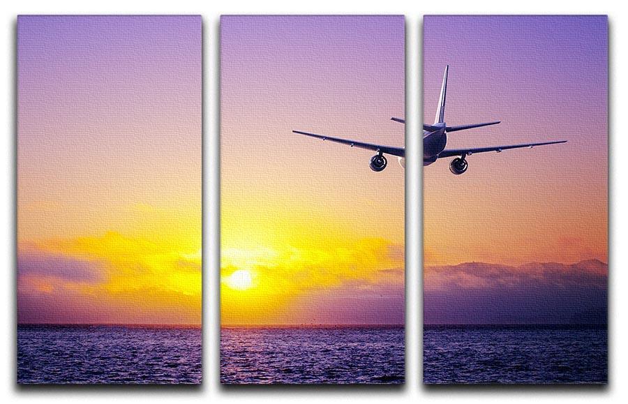 airplane in the sky over ocean 3 Split Panel Canvas Print - Canvas Art Rocks - 1