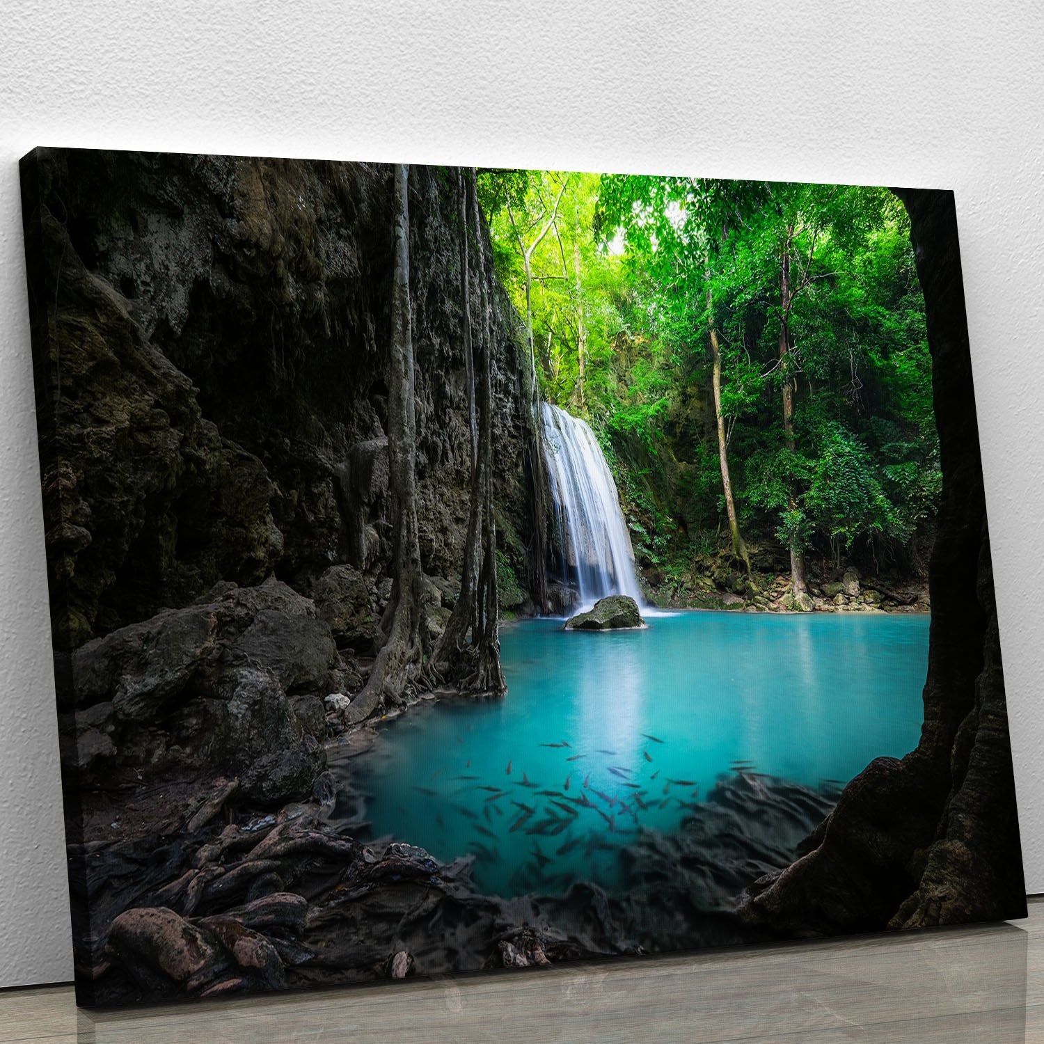 lowing turquoise water of Erawan cascade Canvas Print or Poster