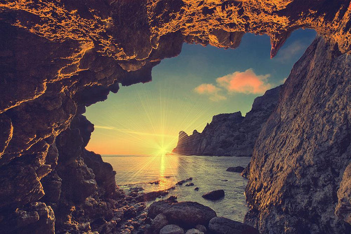 sunset from the mountain cave Wall Mural Wallpaper