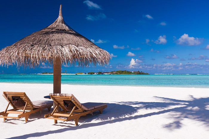 umbrella on a beach with shadow Wall Mural Wallpaper